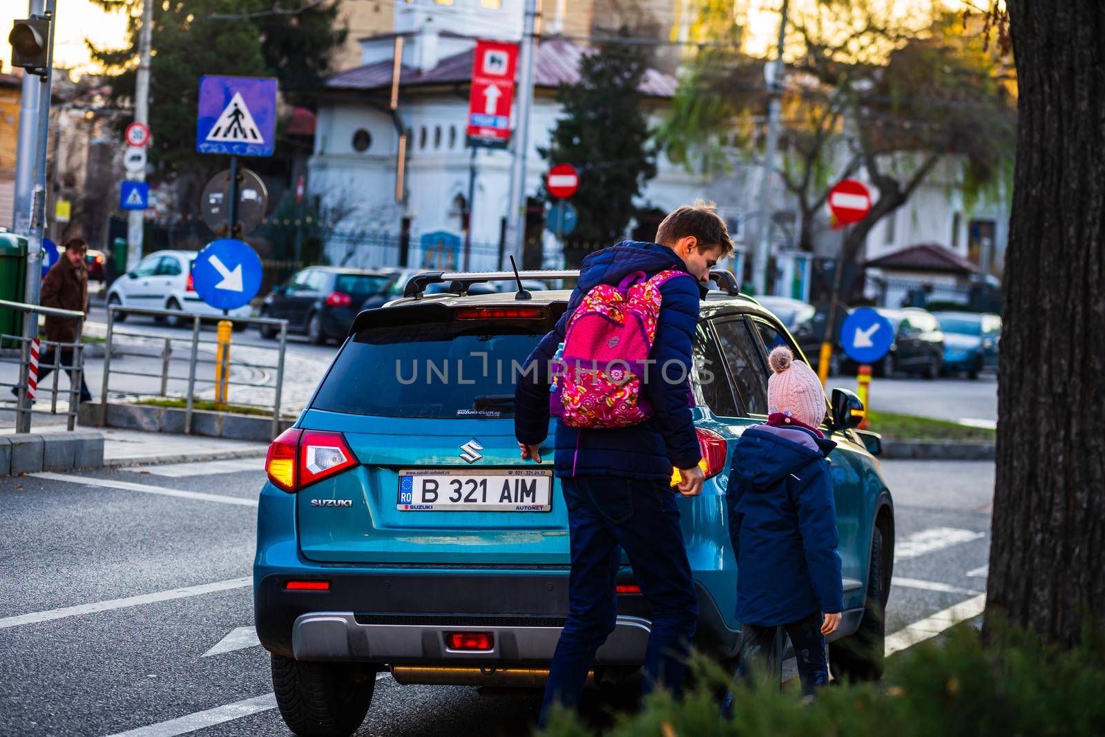 Cars in traffic at rush hour in downtown area of the city. Car pollution, traffic jam in the morning and evening in the capital city of Bucharest, Romania, 2021