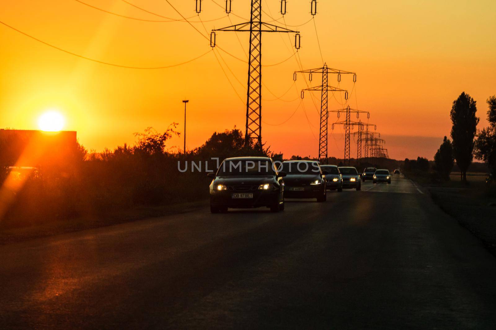 Car traffic at rush hour. Traffic jam, cars on the road at sunset in Bucharest, Romania, 2021