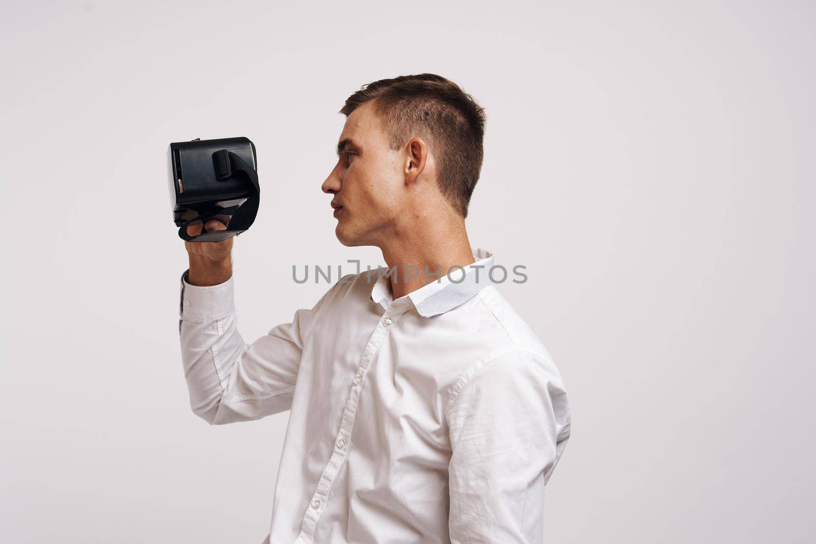 portrait of a man entertainment virtual gaming future 3D light background. High quality photo