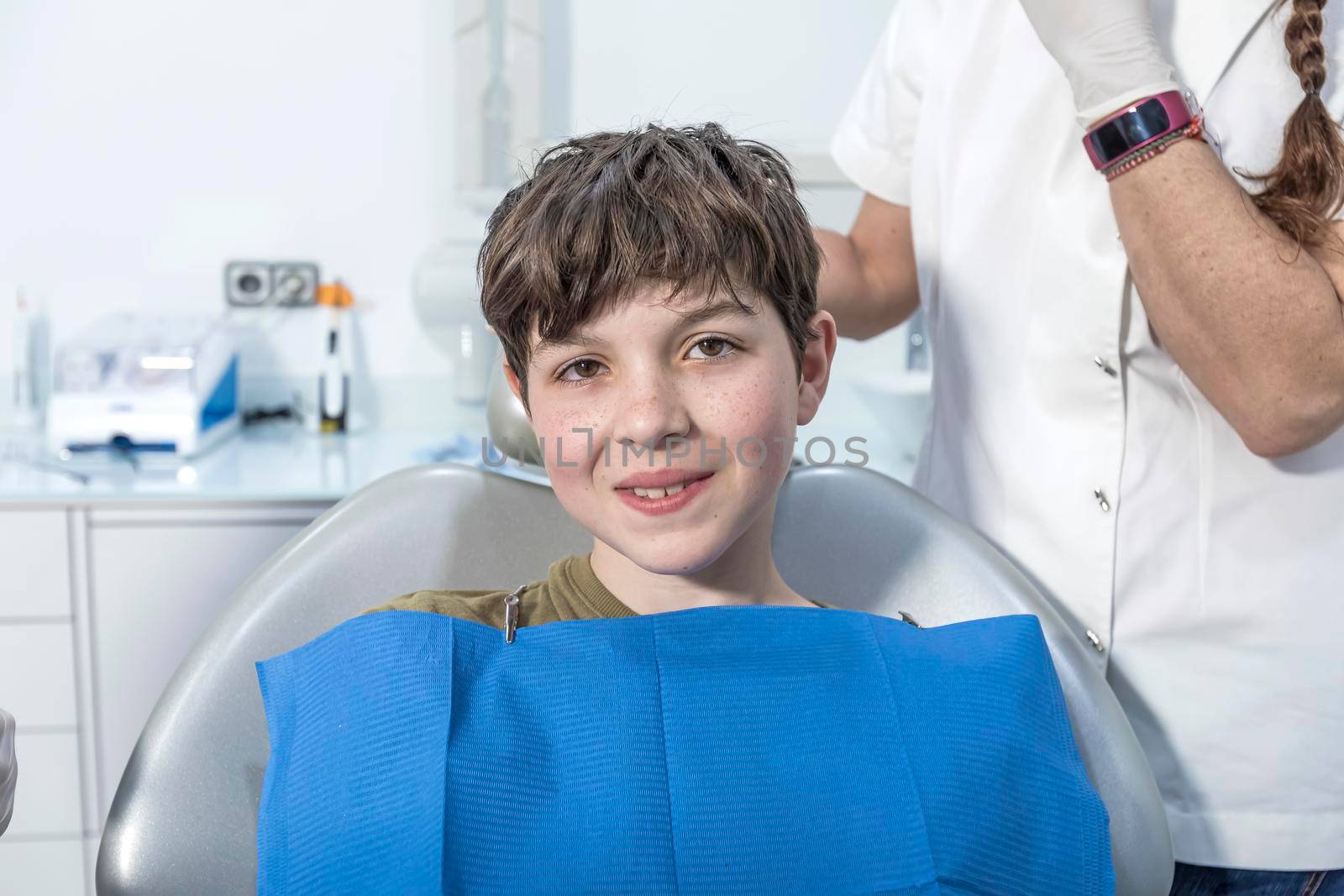 Little boy smiling in the dental office. by Antonelli