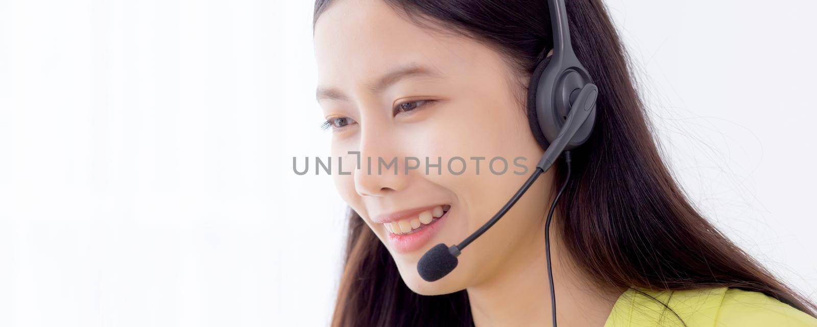 Young asian business woman using laptop computer for video conference online with social distancing, businesswoman working with video call, new normal, communication and work from home concept. by nnudoo