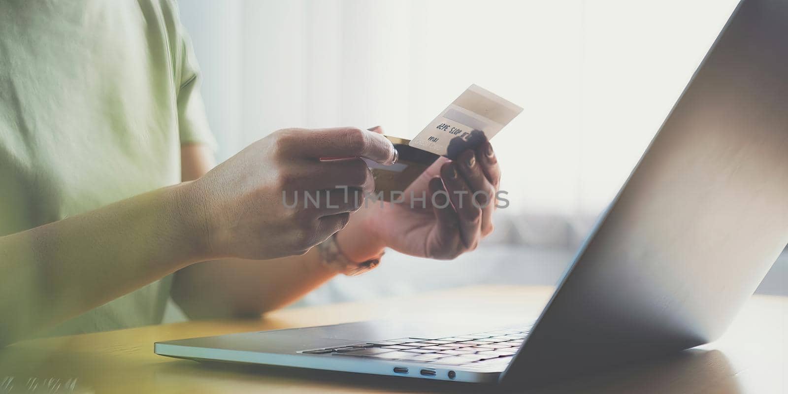 A woman comprear two credit card from other bank for decide using for online payment. online shopping concept. soft focus. by itchaznong