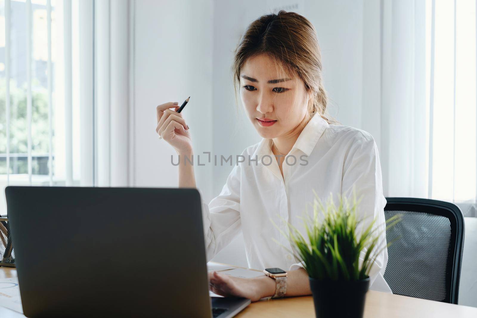 Fund managers researching and analysis Investment stock market by laptop computer. financial concept