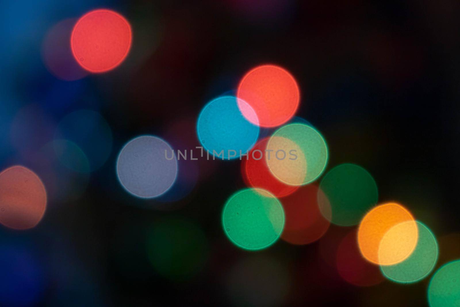 Colorful light bulbs and vivid round bokeh lights tree festive mood lightning by lapushka62