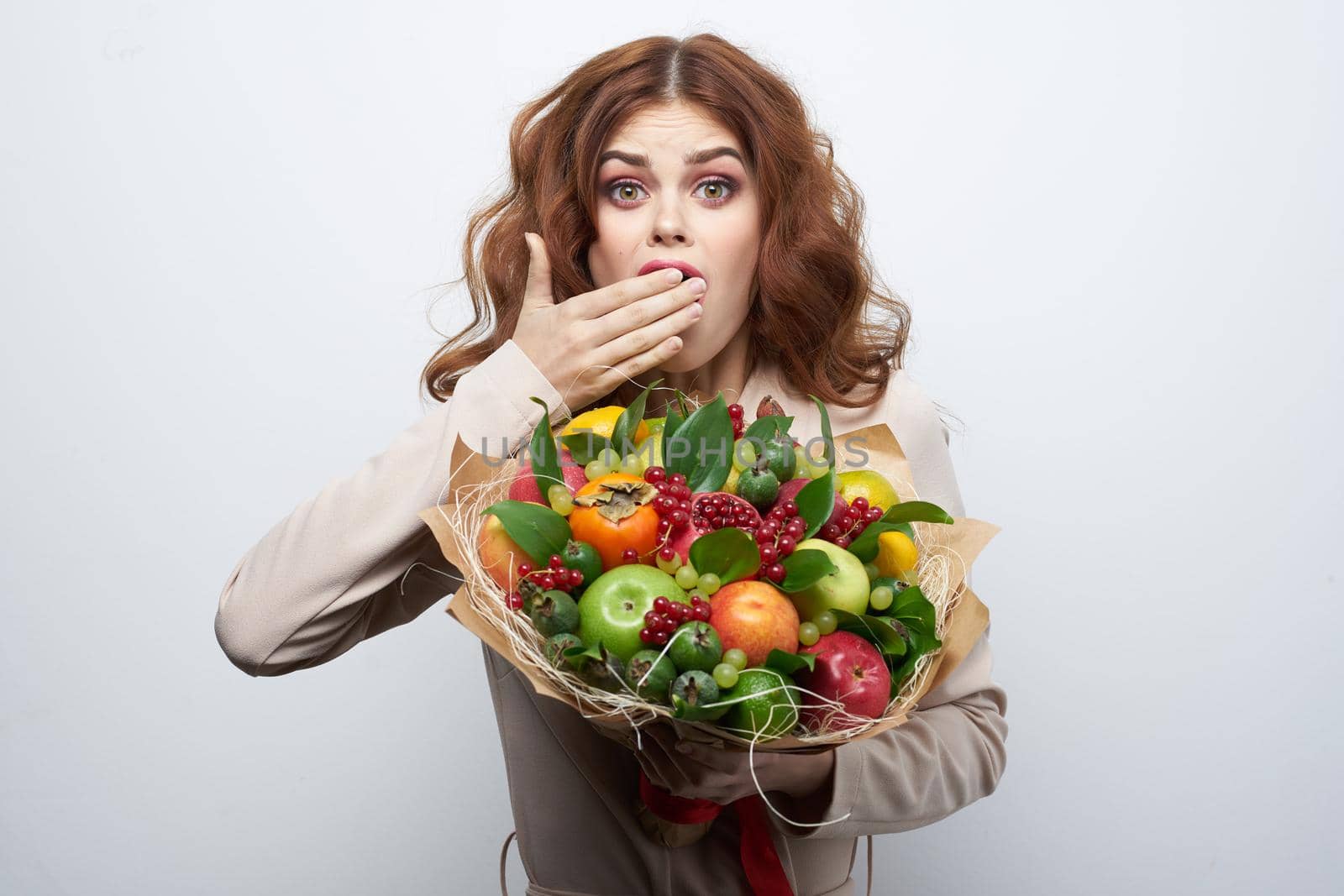 cheerful woman smile posing fresh fruits bouquet emotions light background by Vichizh