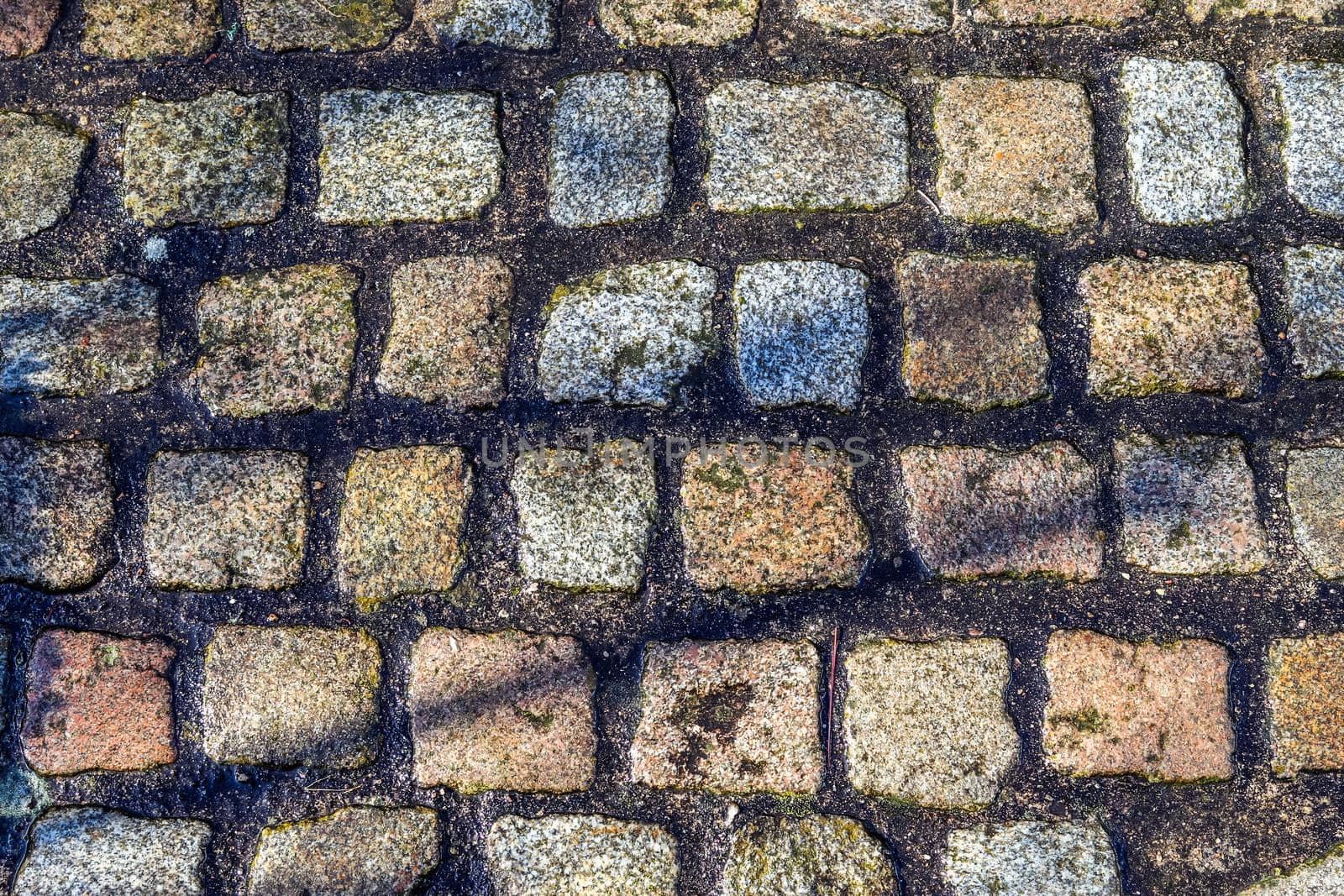 Close up view on old historical cobblestone roads and walkways all over europe by MP_foto71