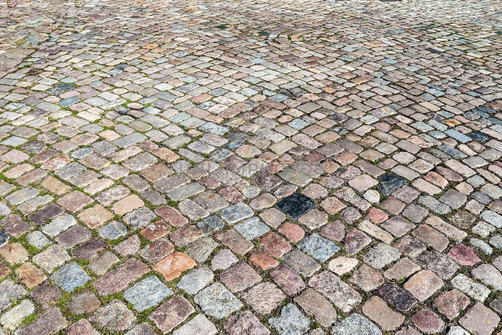 Close up view on old historical cobblestone roads and walkways all over europe by MP_foto71