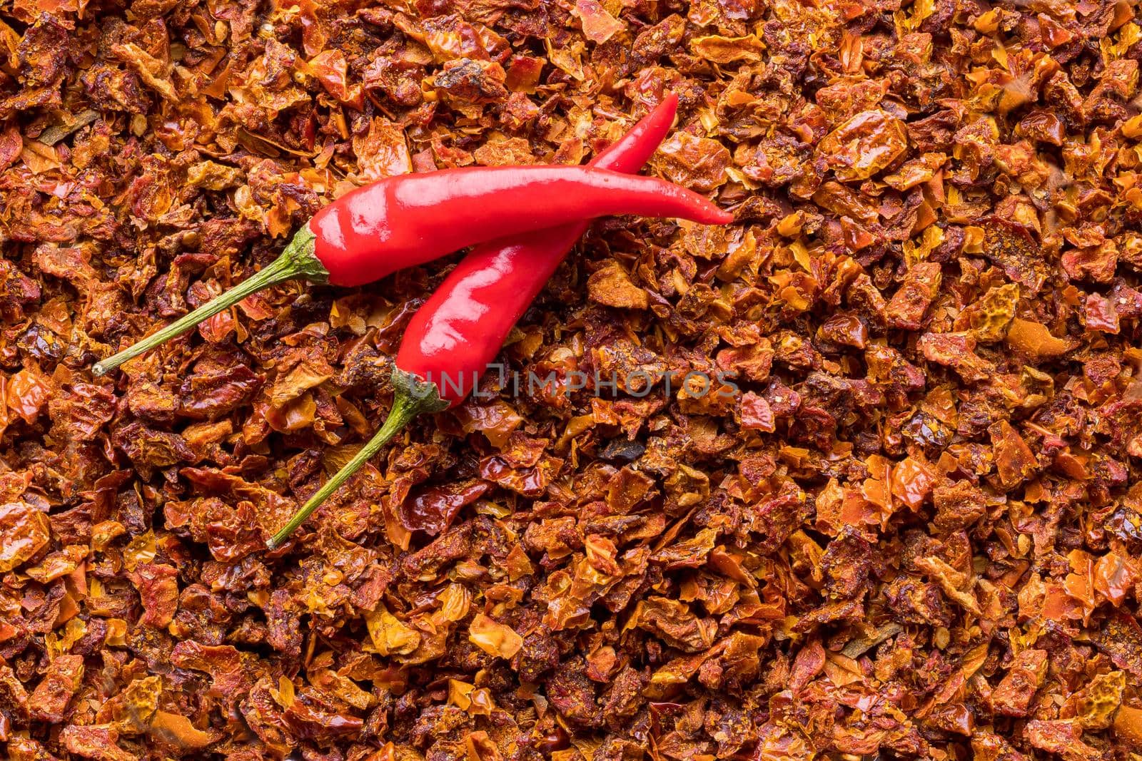 Spices from finely chopped sun-dried tomatoes. Aromatic seasoning for cooking. View from above
