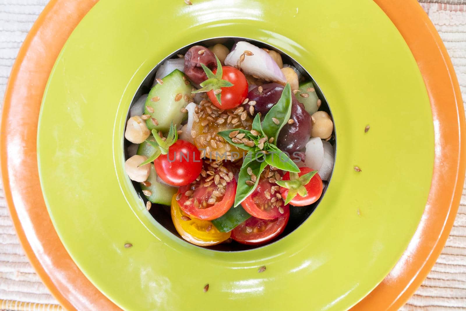 Photo shoot of the colorful and refreshing Mediterranean salad, a complete dish based on seasonal vegetables shown here in the vegan version