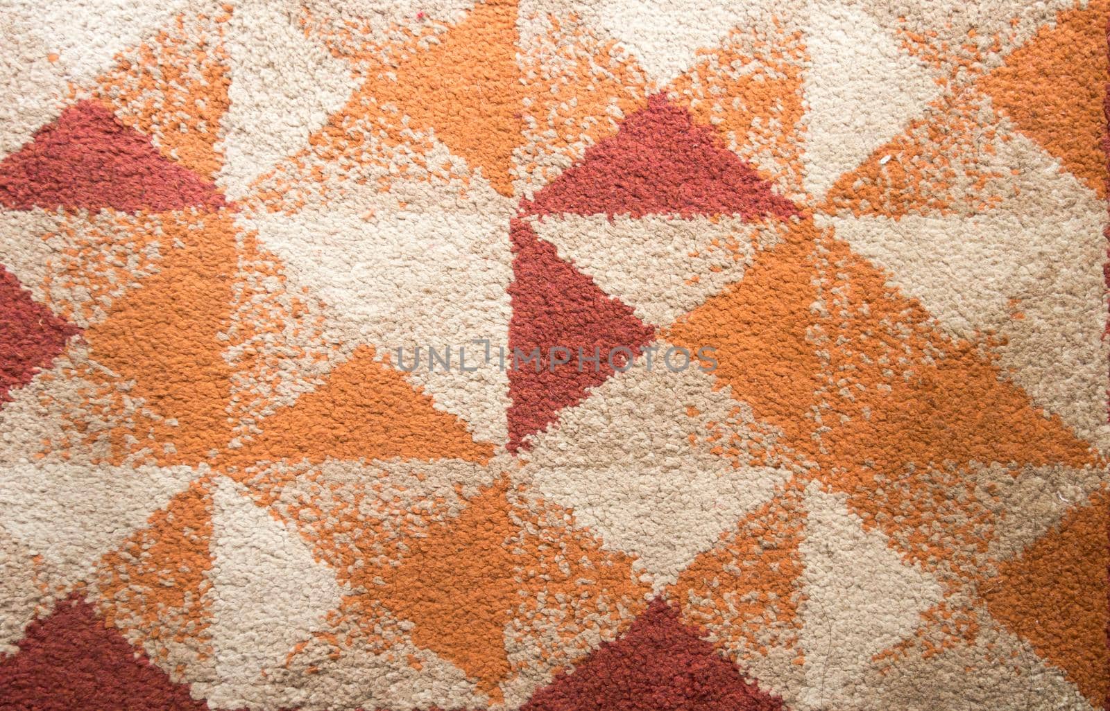 Tongan patterns Wedding motif on Tapa carpet cloth Abstracts backgrounds. Tapa cloth usually form a grid of squares each of which contains geometric patterns with repeated motifs. by sudiptabhowmick
