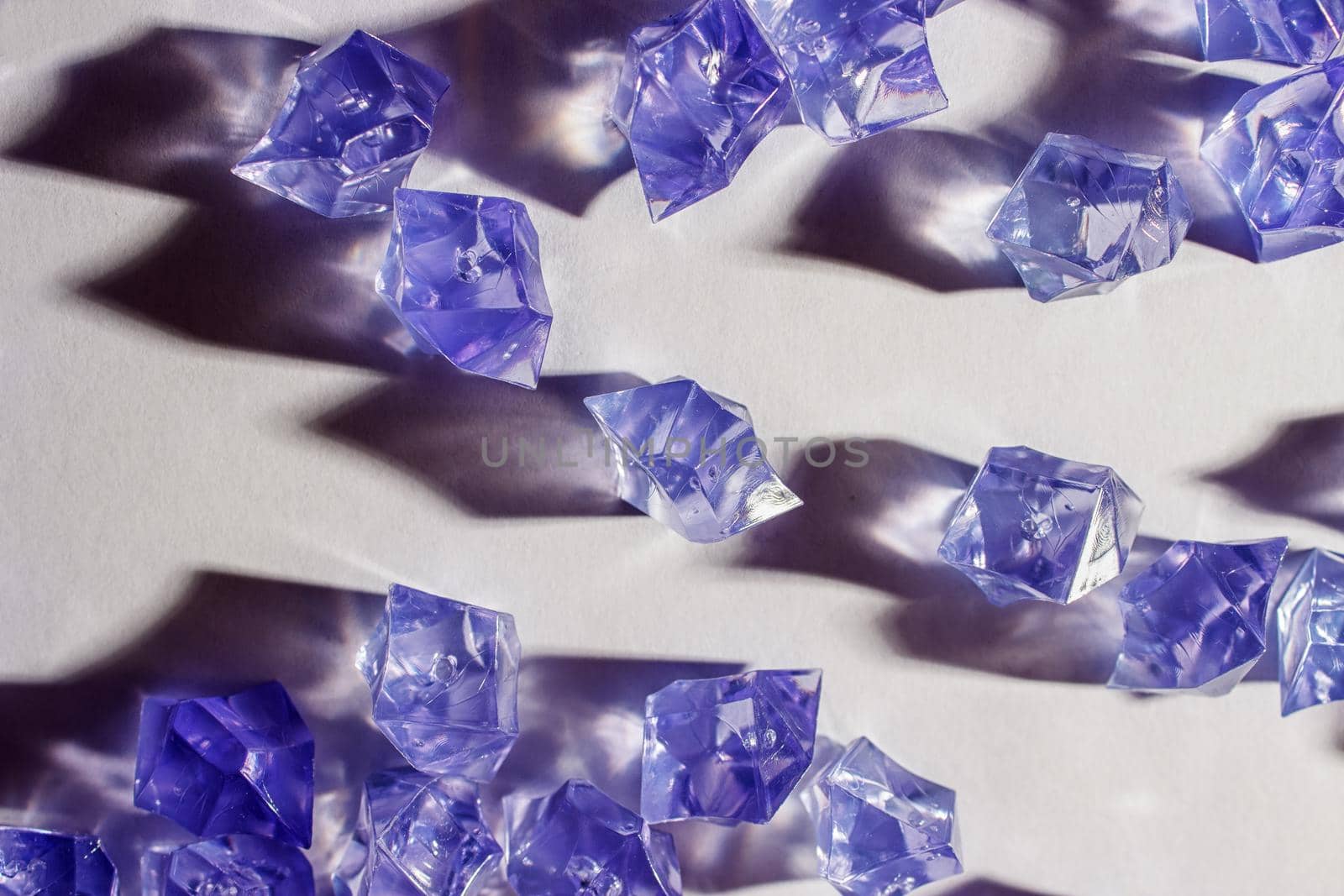 blue glass crystals on the table indoor closeup