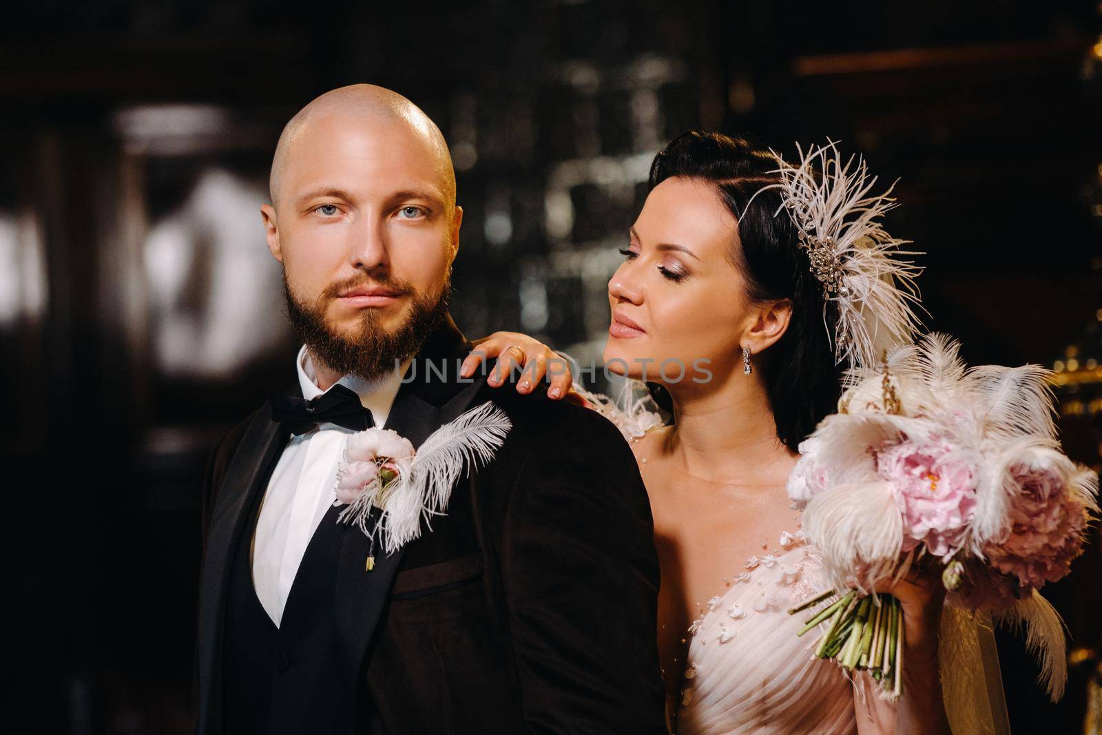 Elegant wedding couple in the interior of the old castle in the city of Nesvizh.