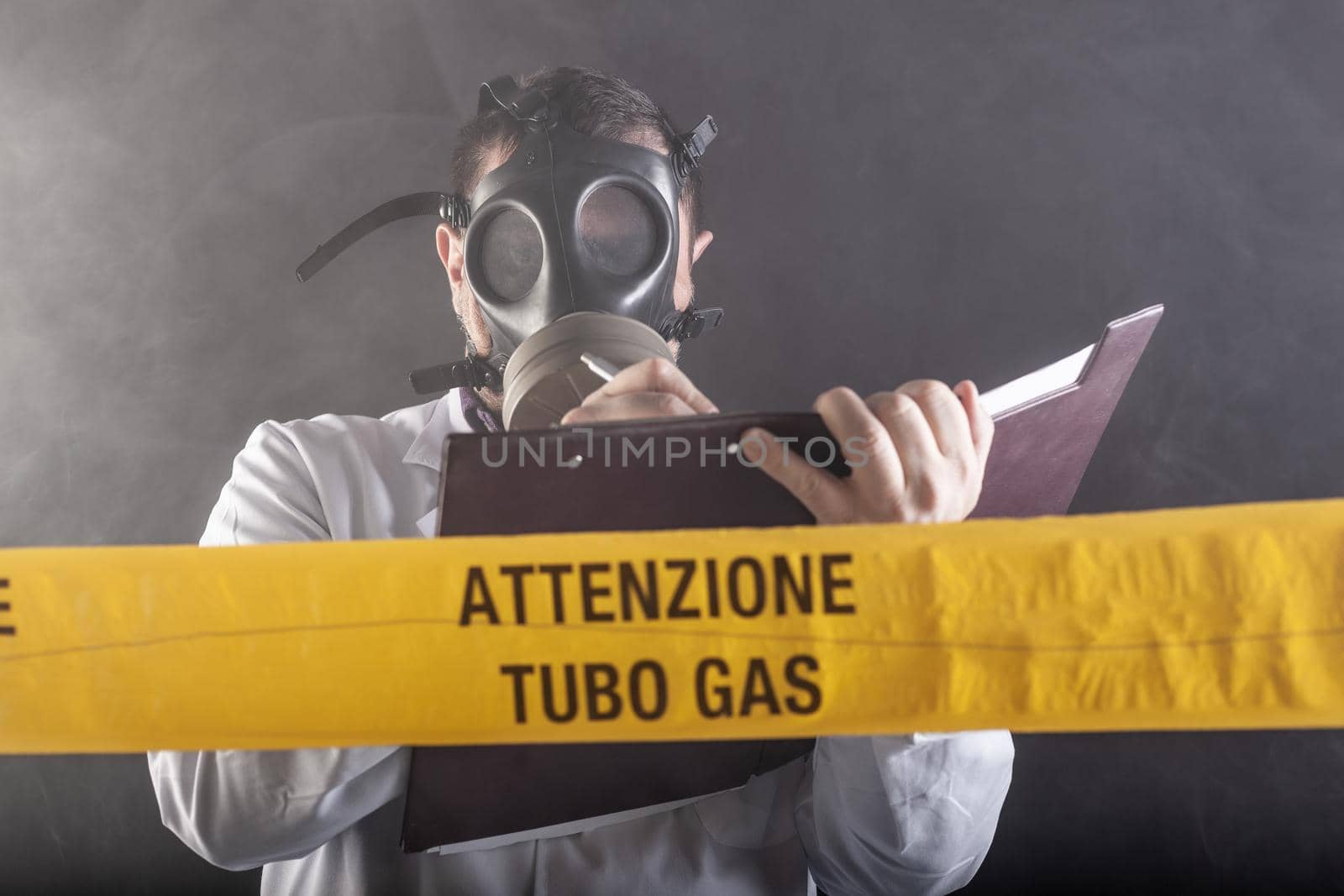 A medical engineer with antigas mask during the gas leaks crisis by bepsimage