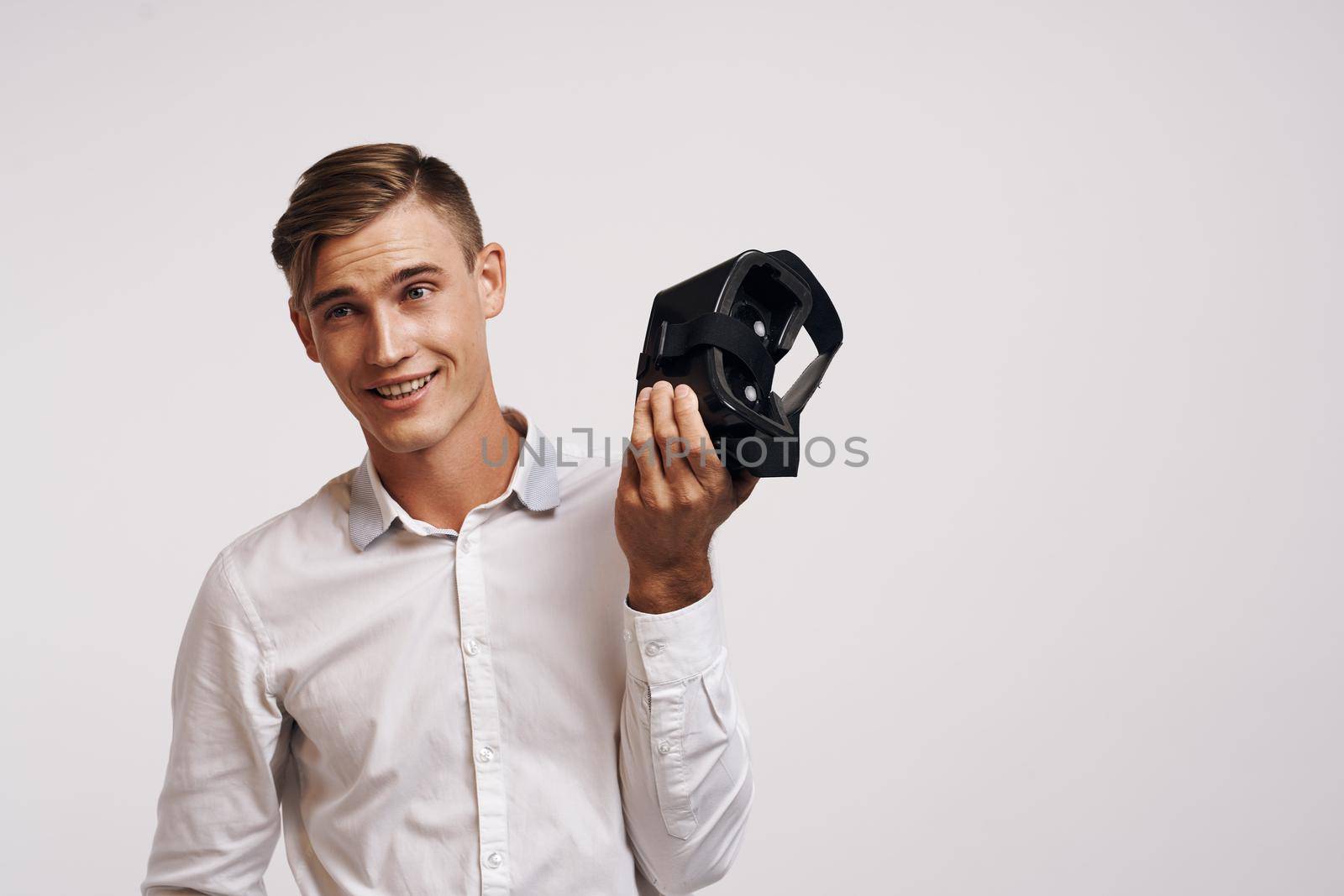 Cheerful man entertainment virtual gaming future 3D isolated background. High quality photo