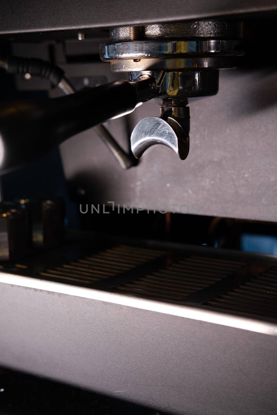 Close-up of Espresso machine making coffee in pub, bar, restaurant. Professional coffee brewing. Coffee Shop Cafeteria Restaurant Service Concept.