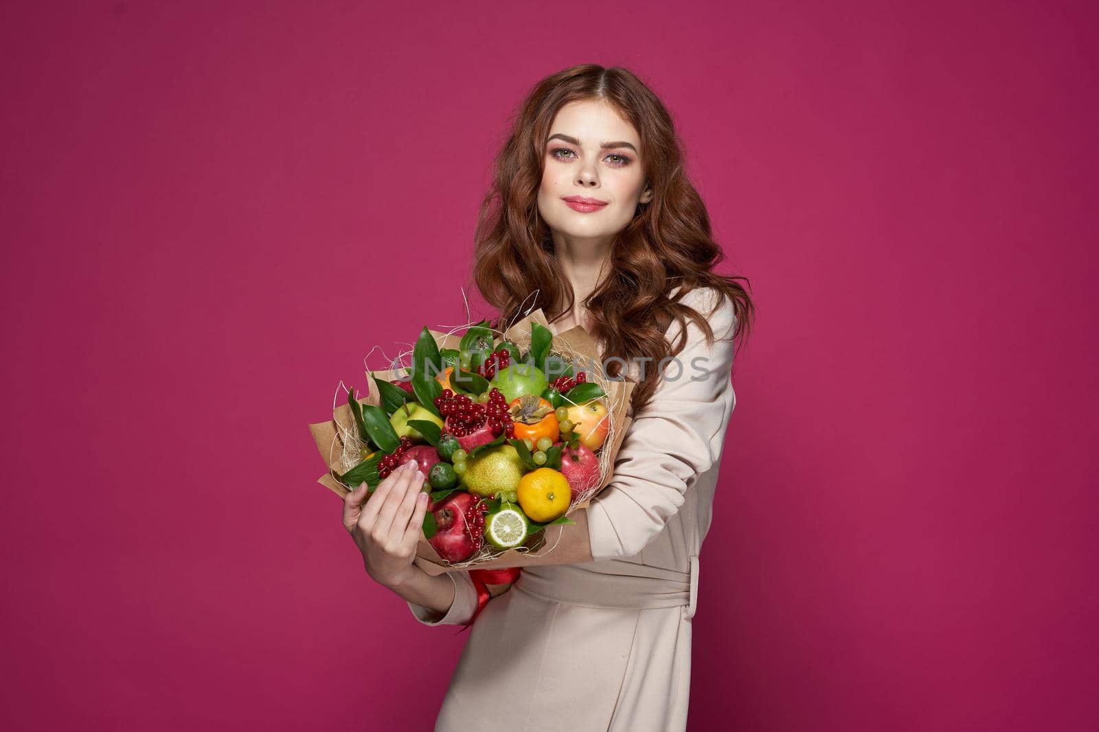 cheerful woman smile posing fresh fruits bouquet emotions isolated background by Vichizh