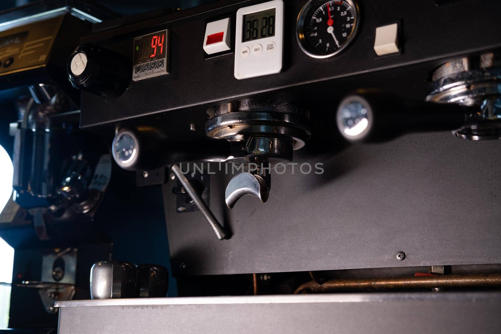 Close-up of Espresso machine making coffee in pub, bar, restaurant. Professional coffee brewing. Coffee Shop Cafeteria Restaurant Service Concept.