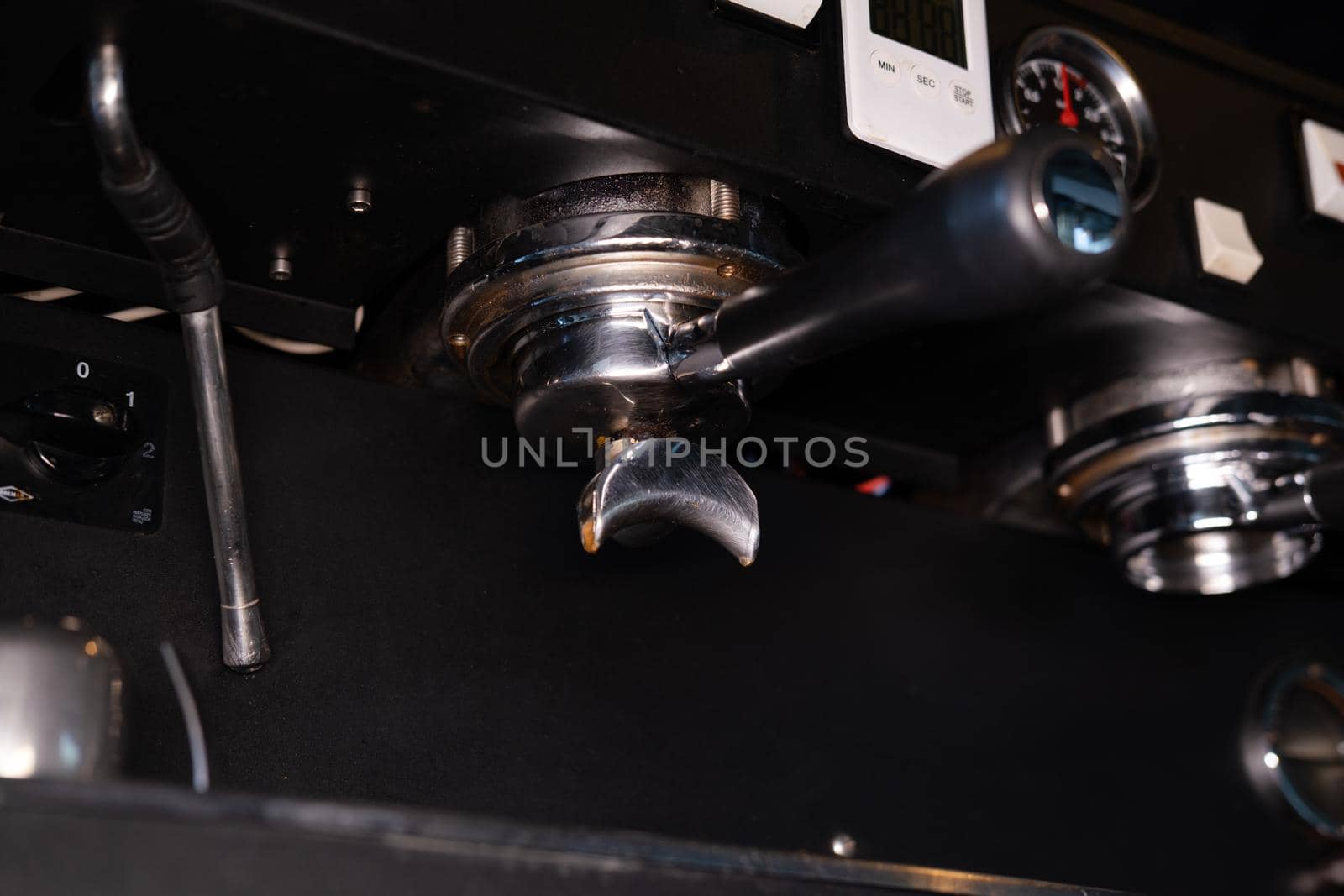 close up of a professional coffee machine. loft dark coffee shop.