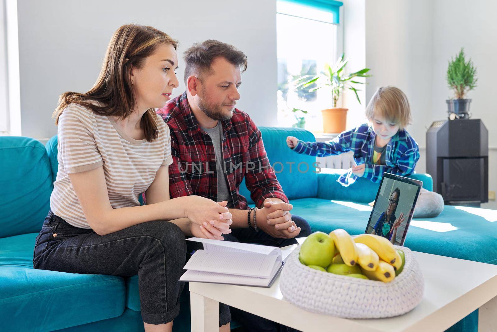 Telemedicine, middle aged couple using laptop for video meeting with doctor by VH-studio