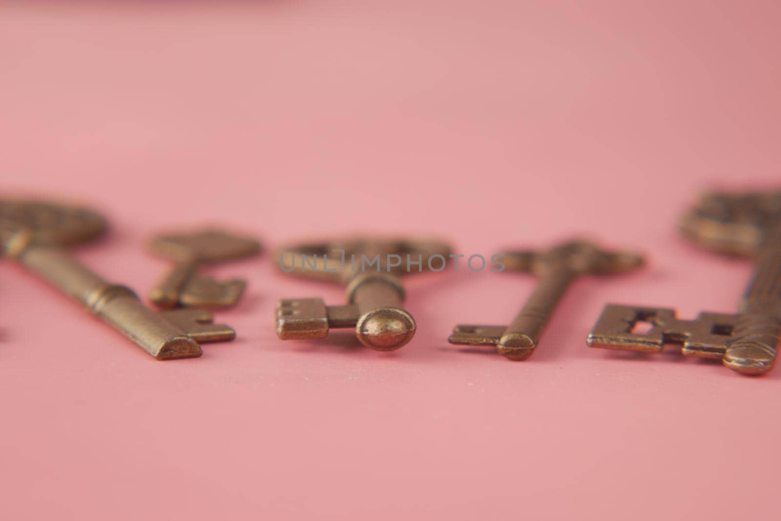 many old keys on pick background .