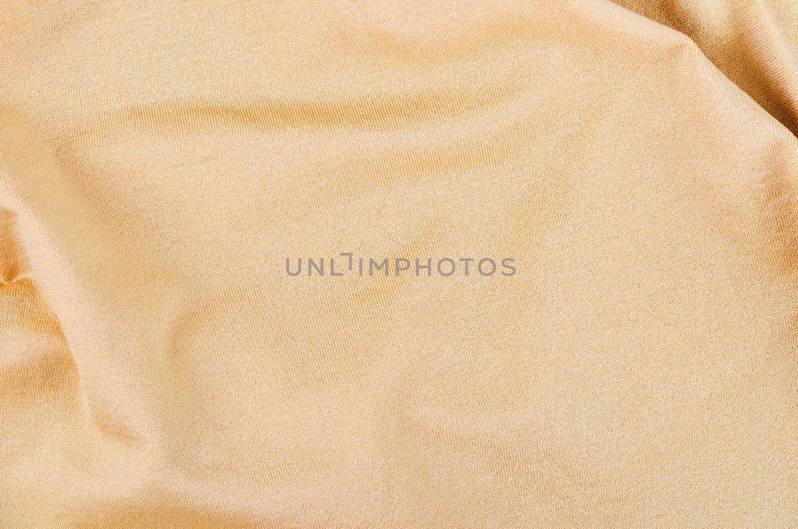 Brown fabric texture for clothes, as background.