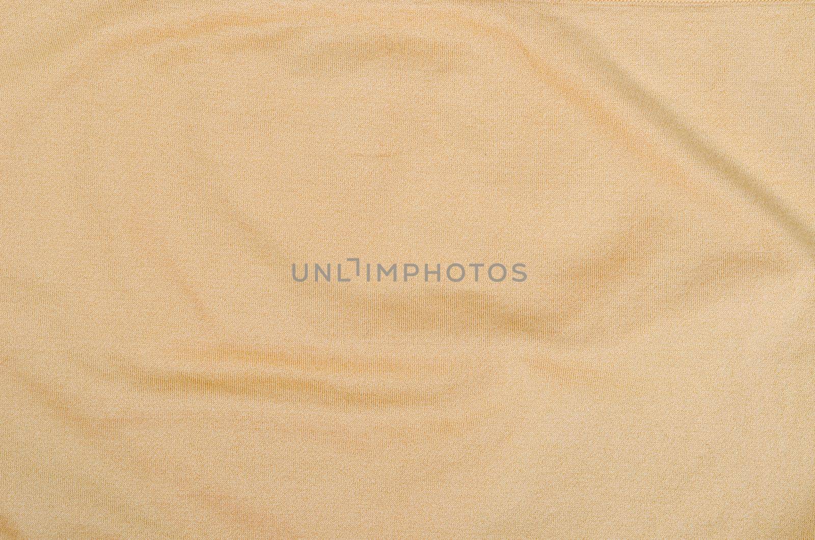 Brown fabric texture for clothes, as background.