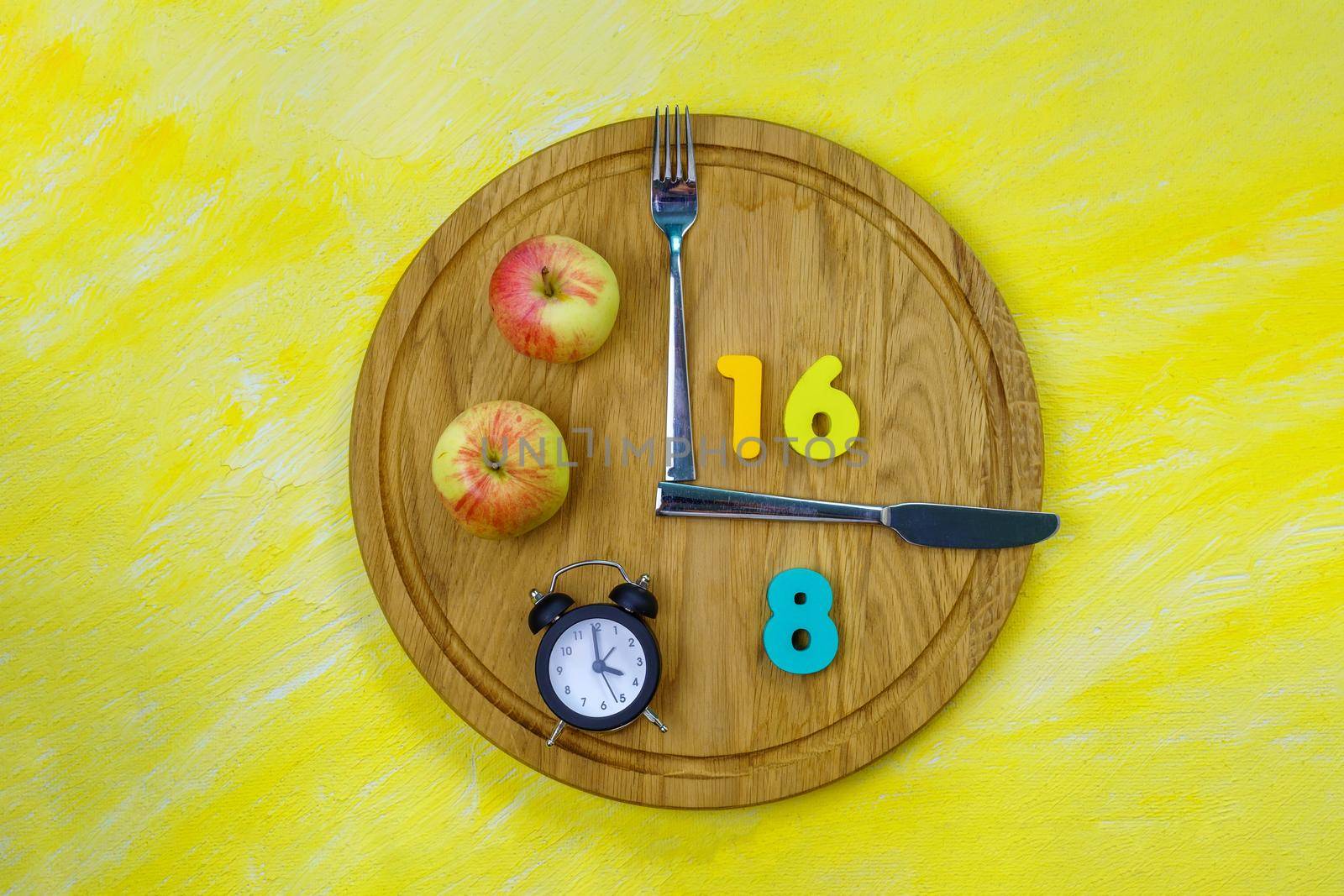 Intermittent Fasting 16:8. Popular health and fitness trend. Flat lay. Healthy eating, weight loss by darksoul72