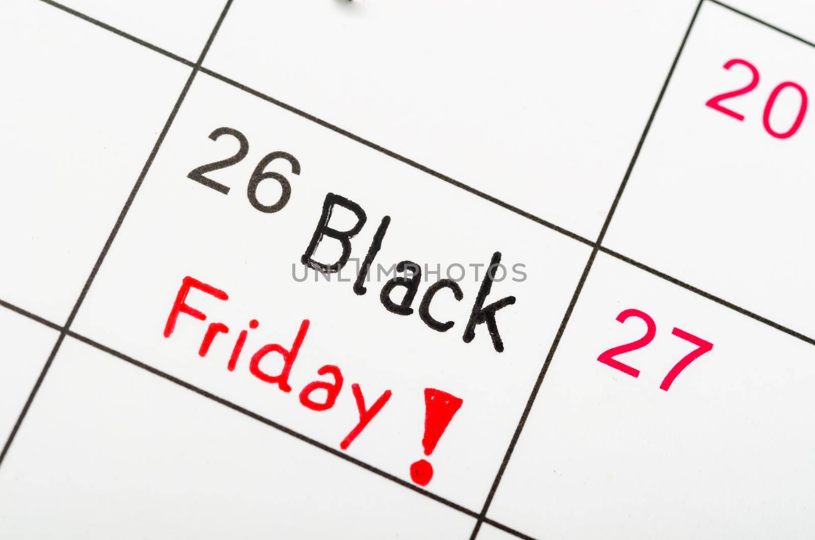 Handwritten Black Friday event day marked on a white calendar.