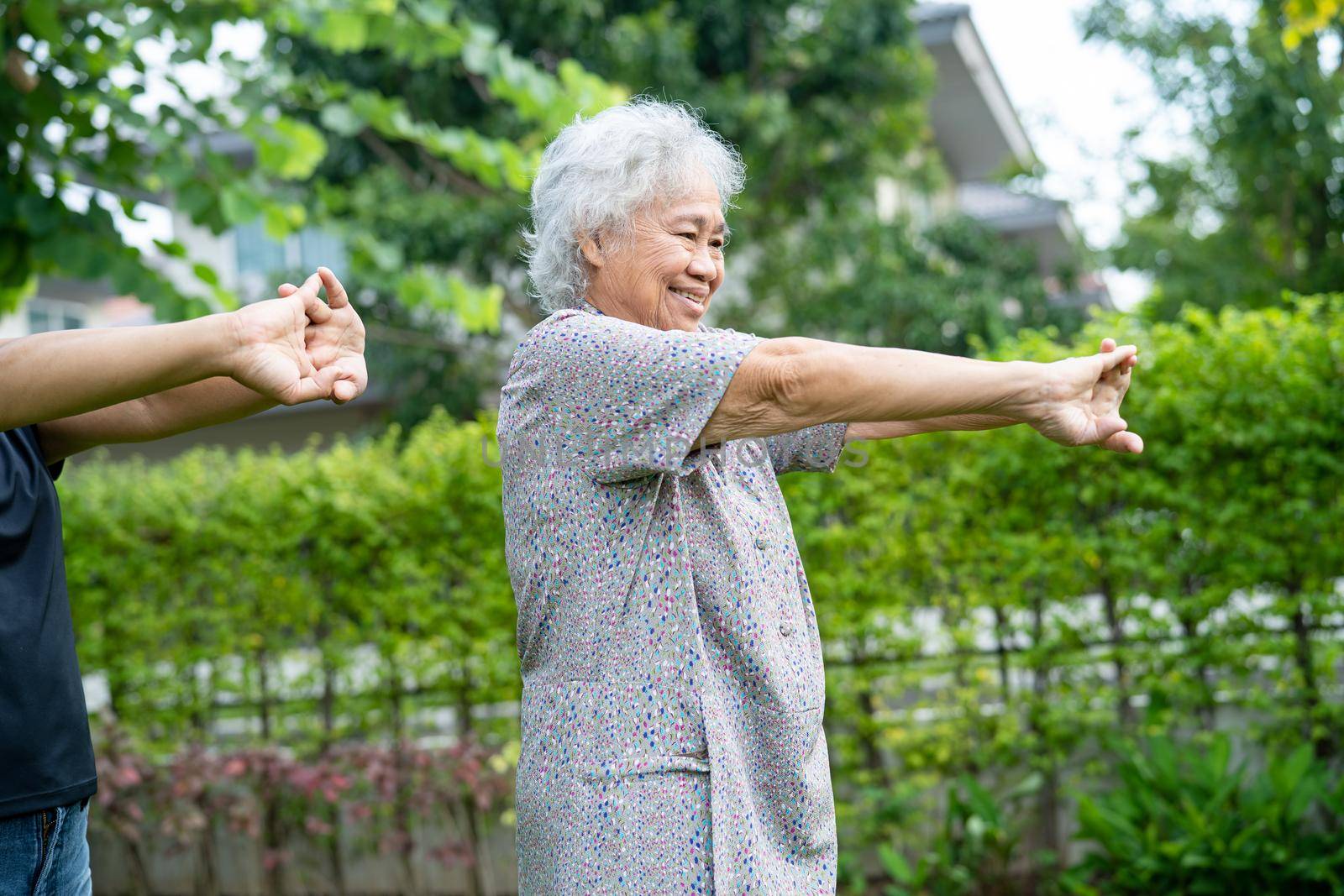 Asian senior or elderly old lady woman patient exercise with happy fresh enjoy in park, healthy strong medical concept