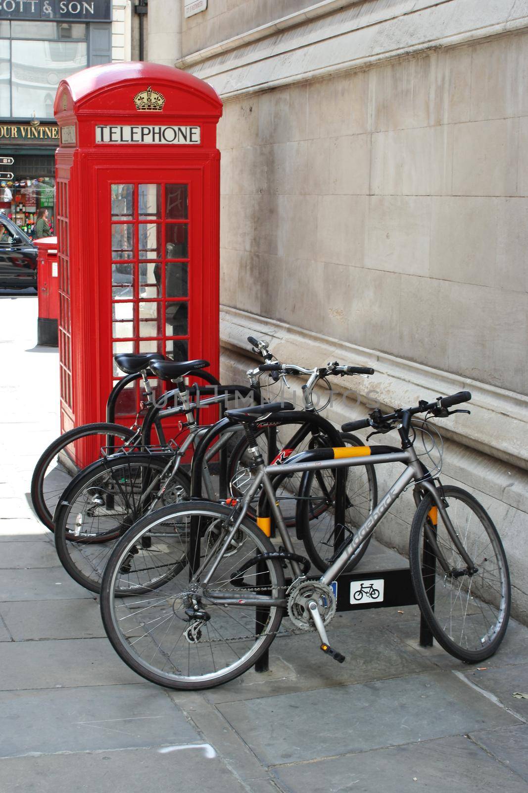 Bicycles and a red london telephone box and post box