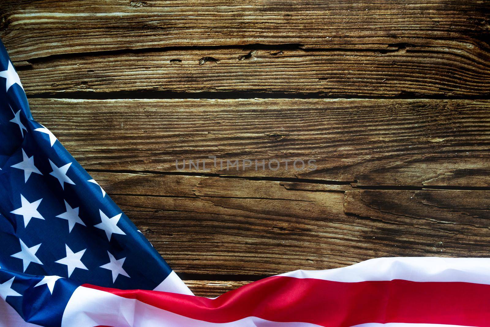Veterans day. Honoring all who served. American flag on wooden background by psodaz