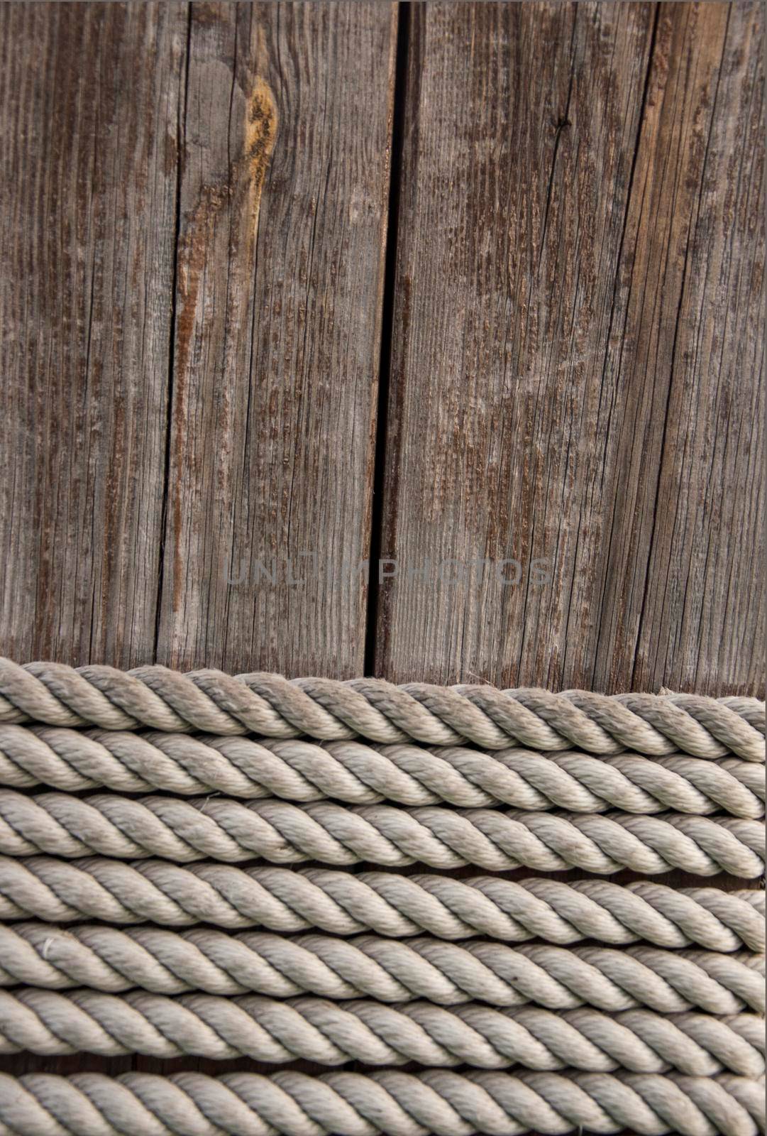 wood background with rope by inxti