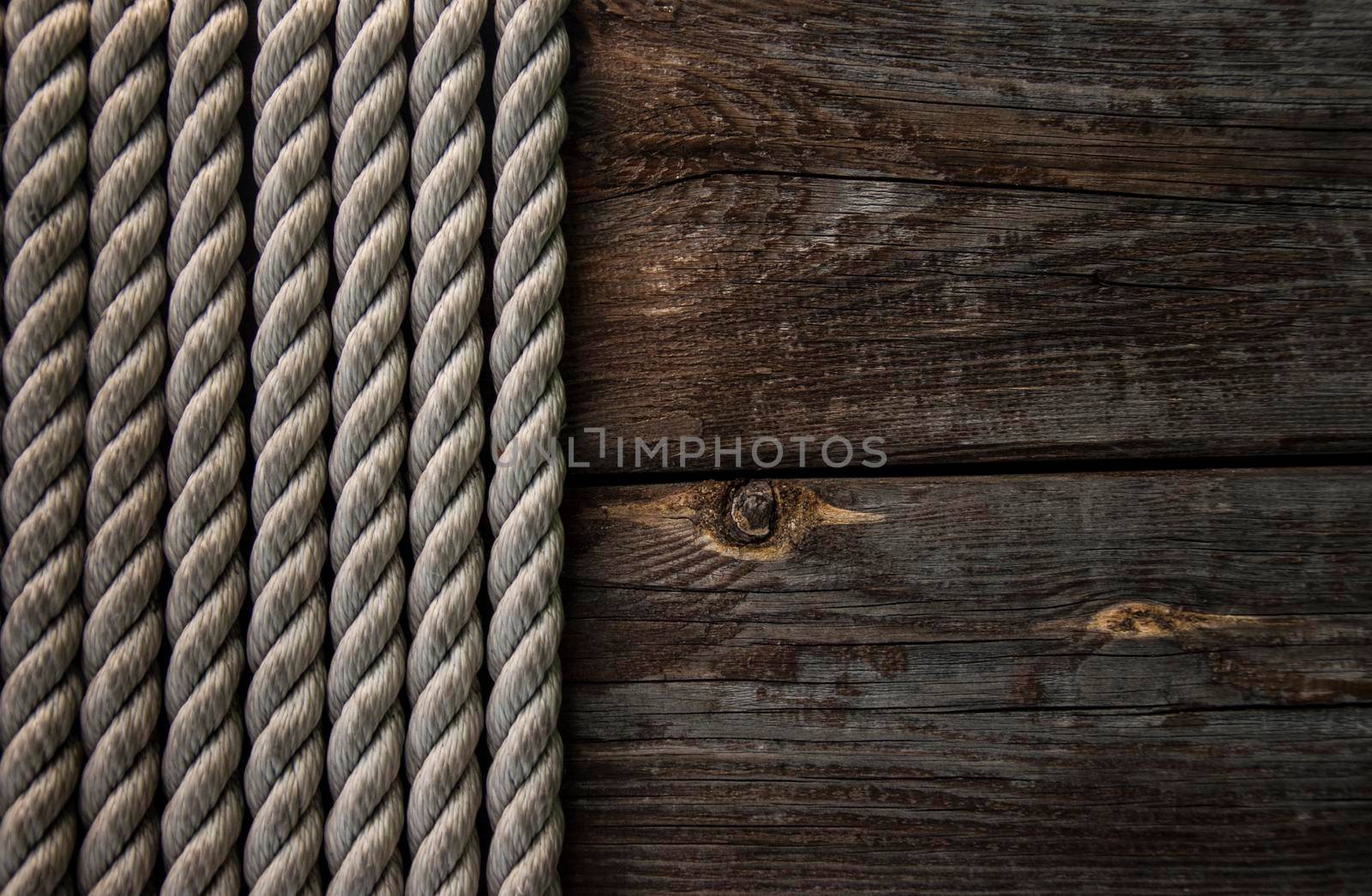 wood background with rope by inxti