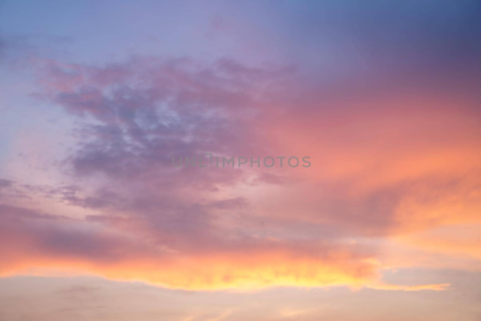 Beautiful dramtic cloudy sky sunset background under sea water With yellow red colors