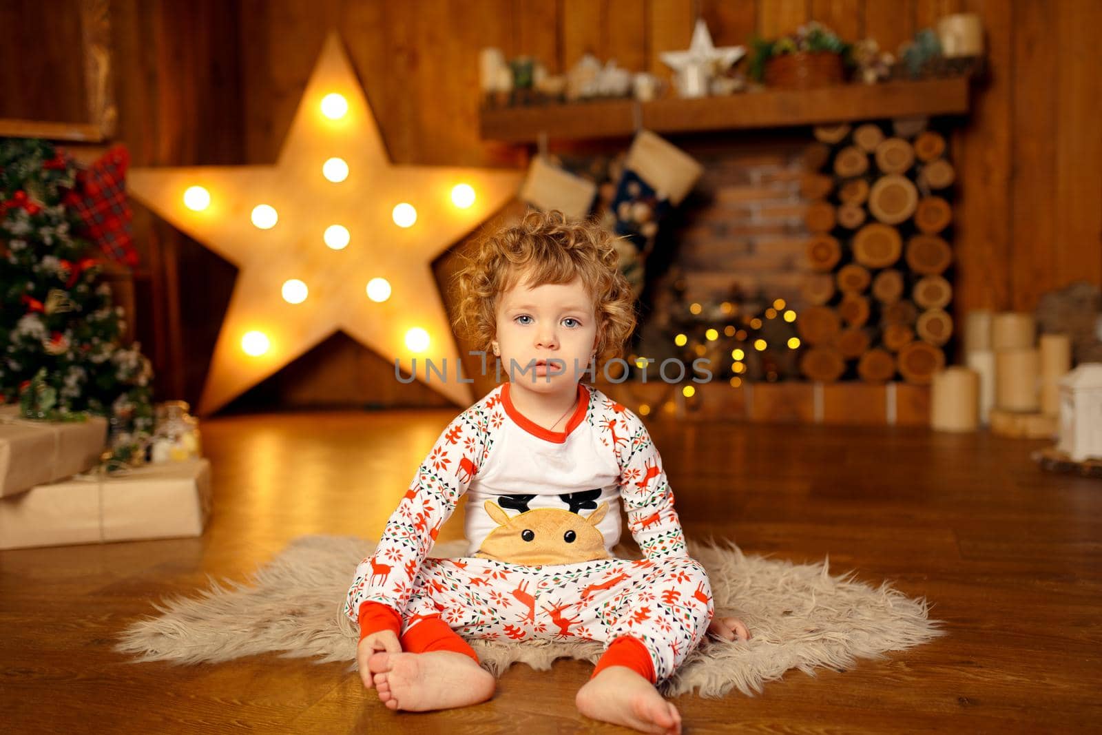 The child is exited and ready to celebrate Christmas by Try_my_best
