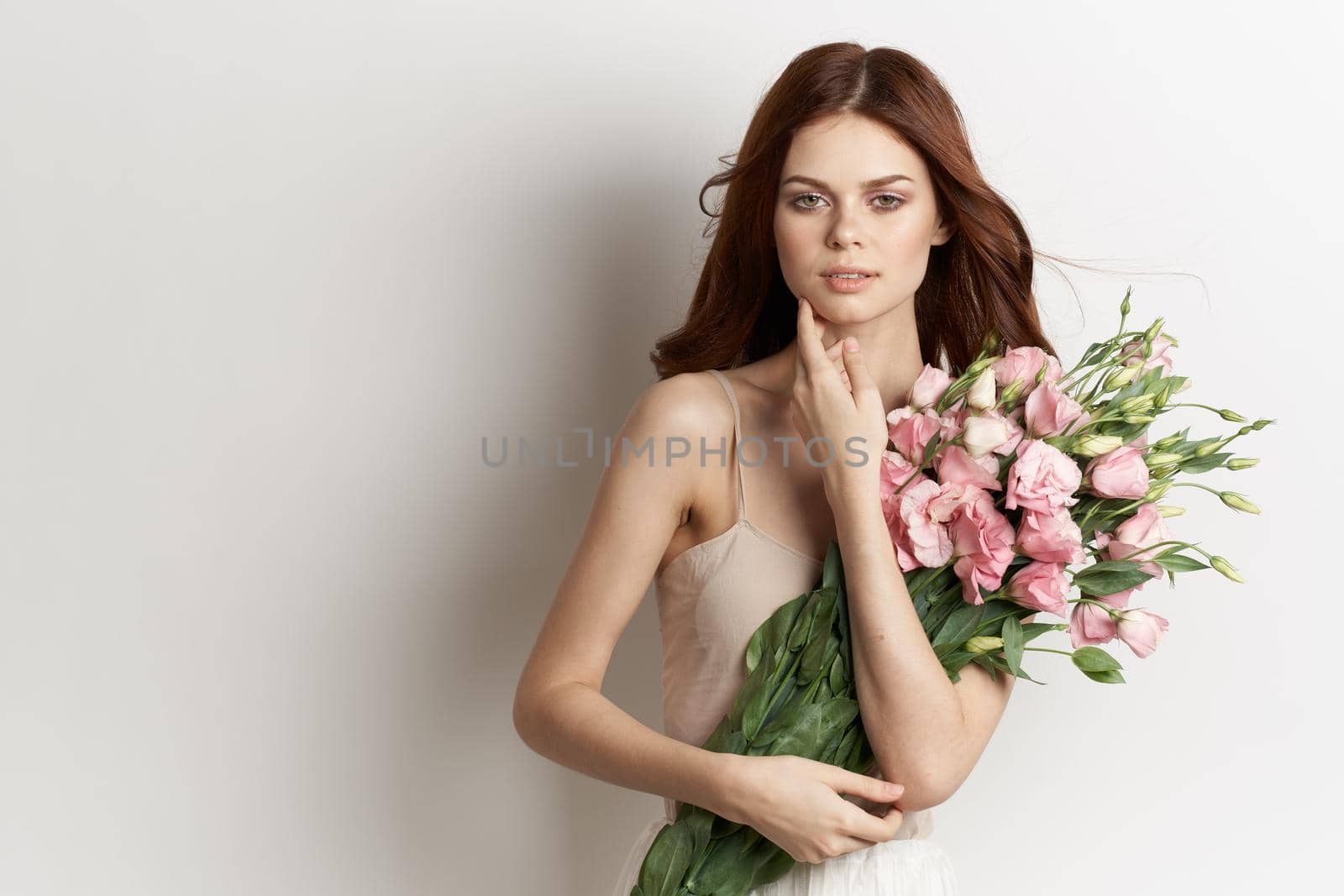beautiful woman pink flower bouquet fashion summer light background by Vichizh