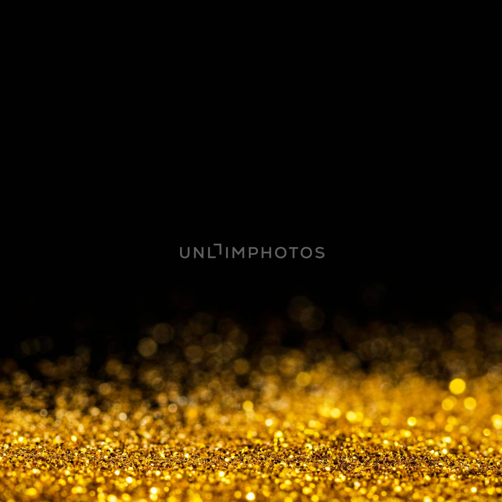 dazzling gold glitter with copy space. High resolution photo