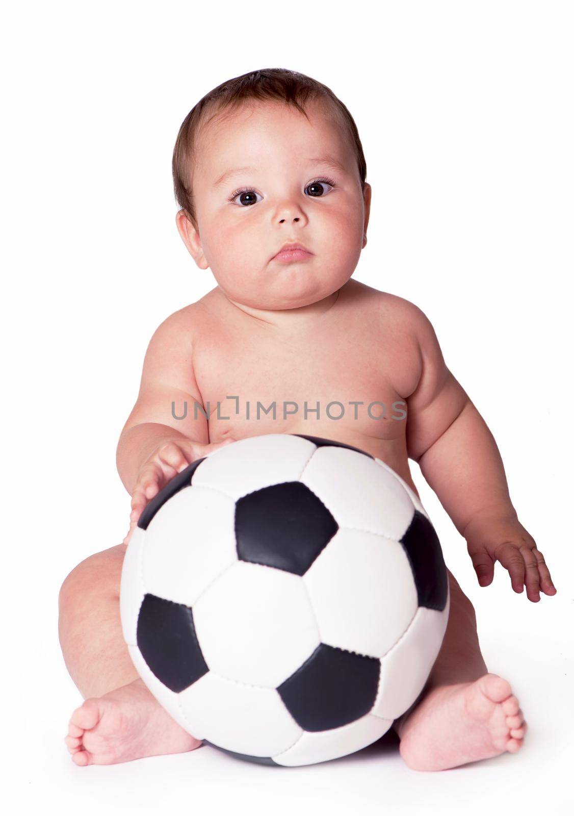 Baby playing with soccer ball. All on white background