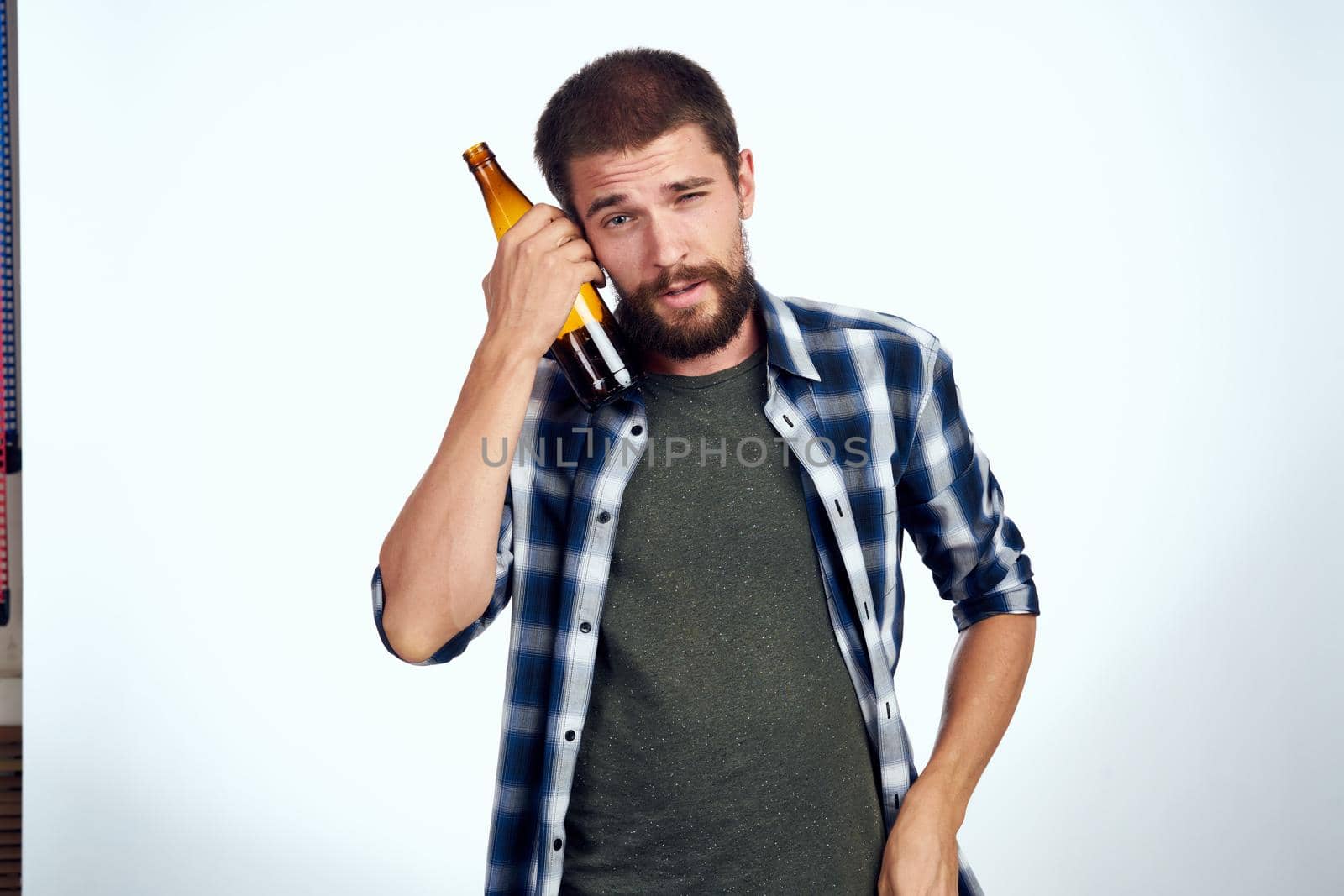 a man in a plaid shirt alcoholism problems emotions depression Lifestyle. High quality photo