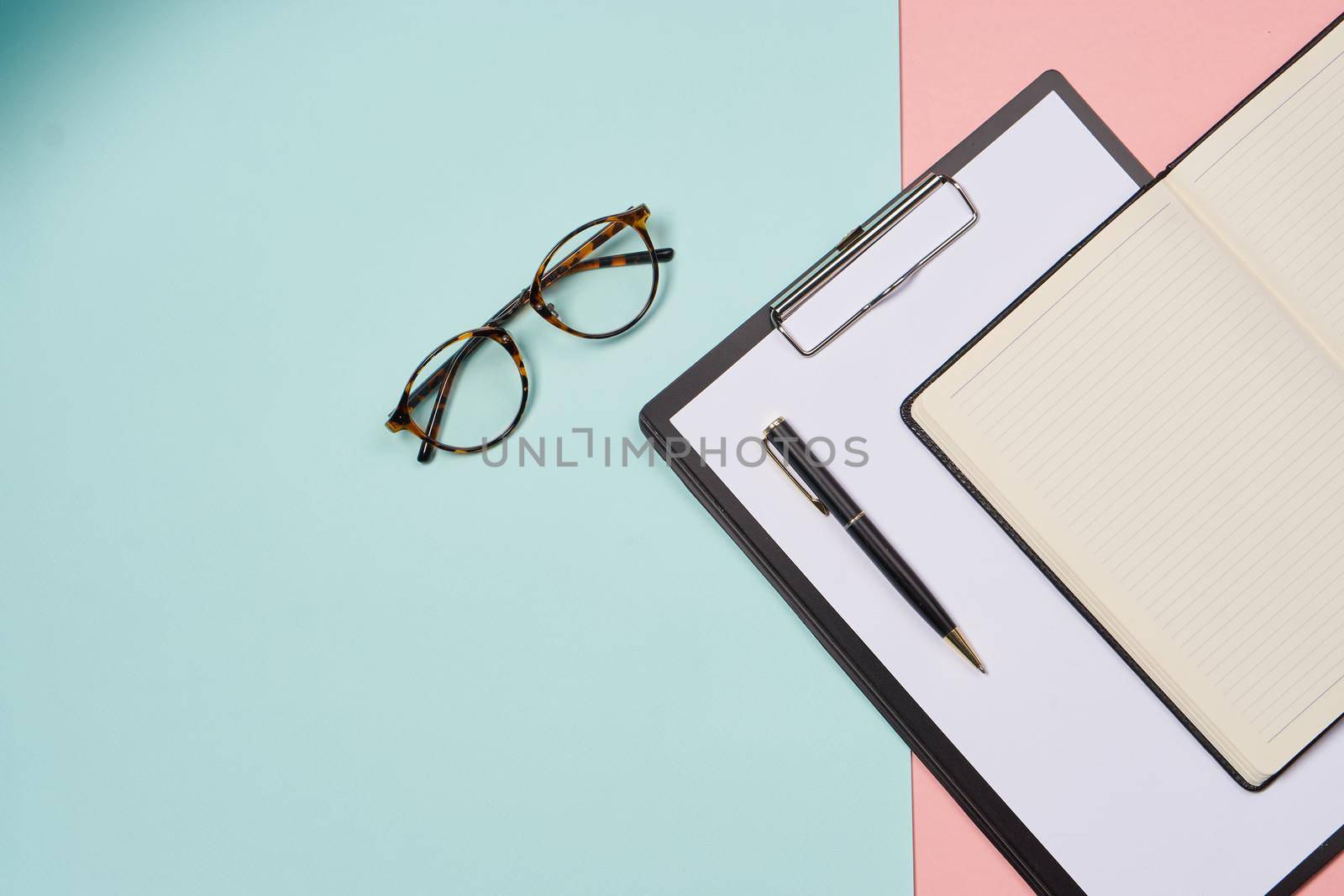 folder for papers office accessories notepad colorful background business tools. High quality photo