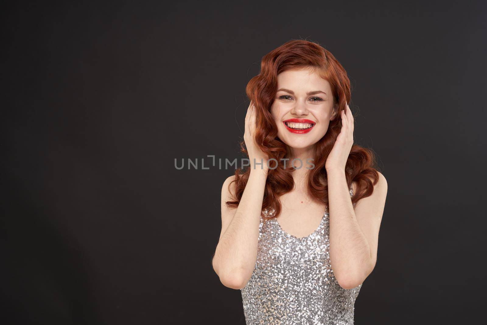 red-haired woman bright makeup glamor posing evening dresses by Vichizh