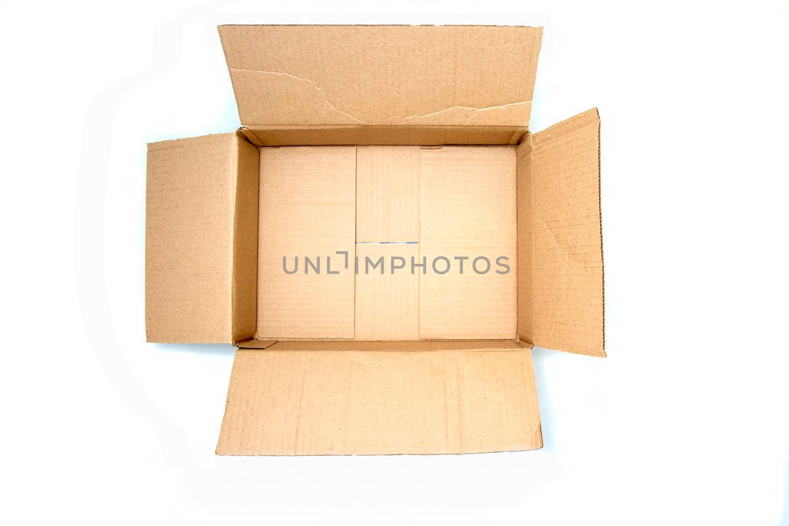 top view: open empty cardboard box with space for copy space. concept: moving, packaging, gift. isolated