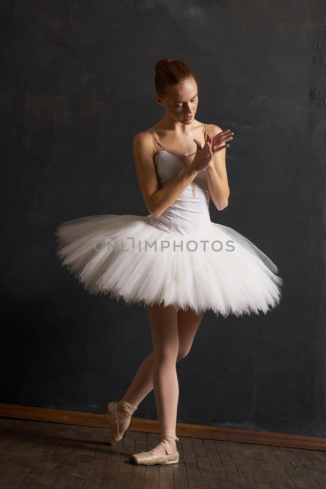 woman ballerina in white tutu performance grace dance by Vichizh