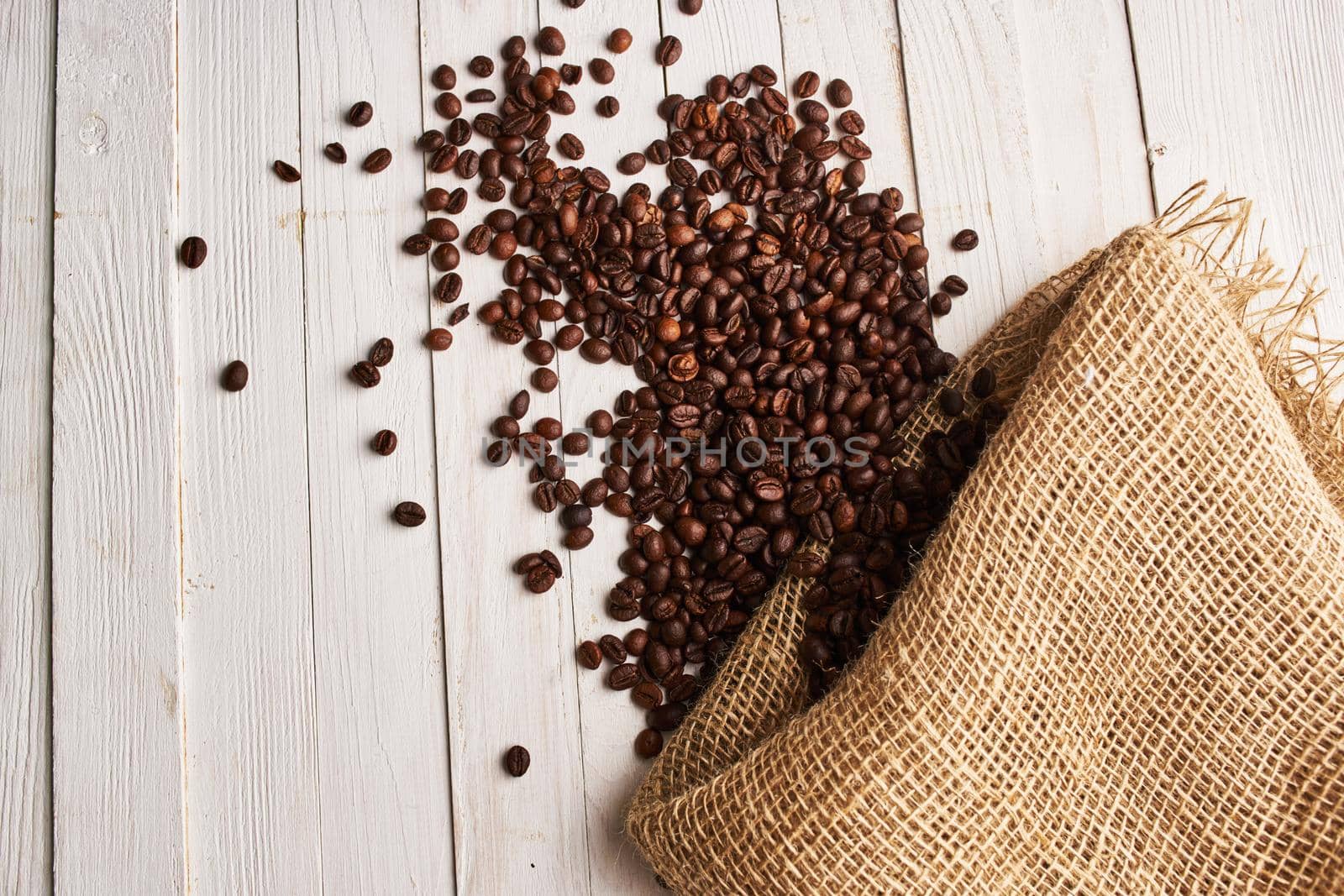 coffee beans Hot drink spilled grains caffeine pattern. High quality photo