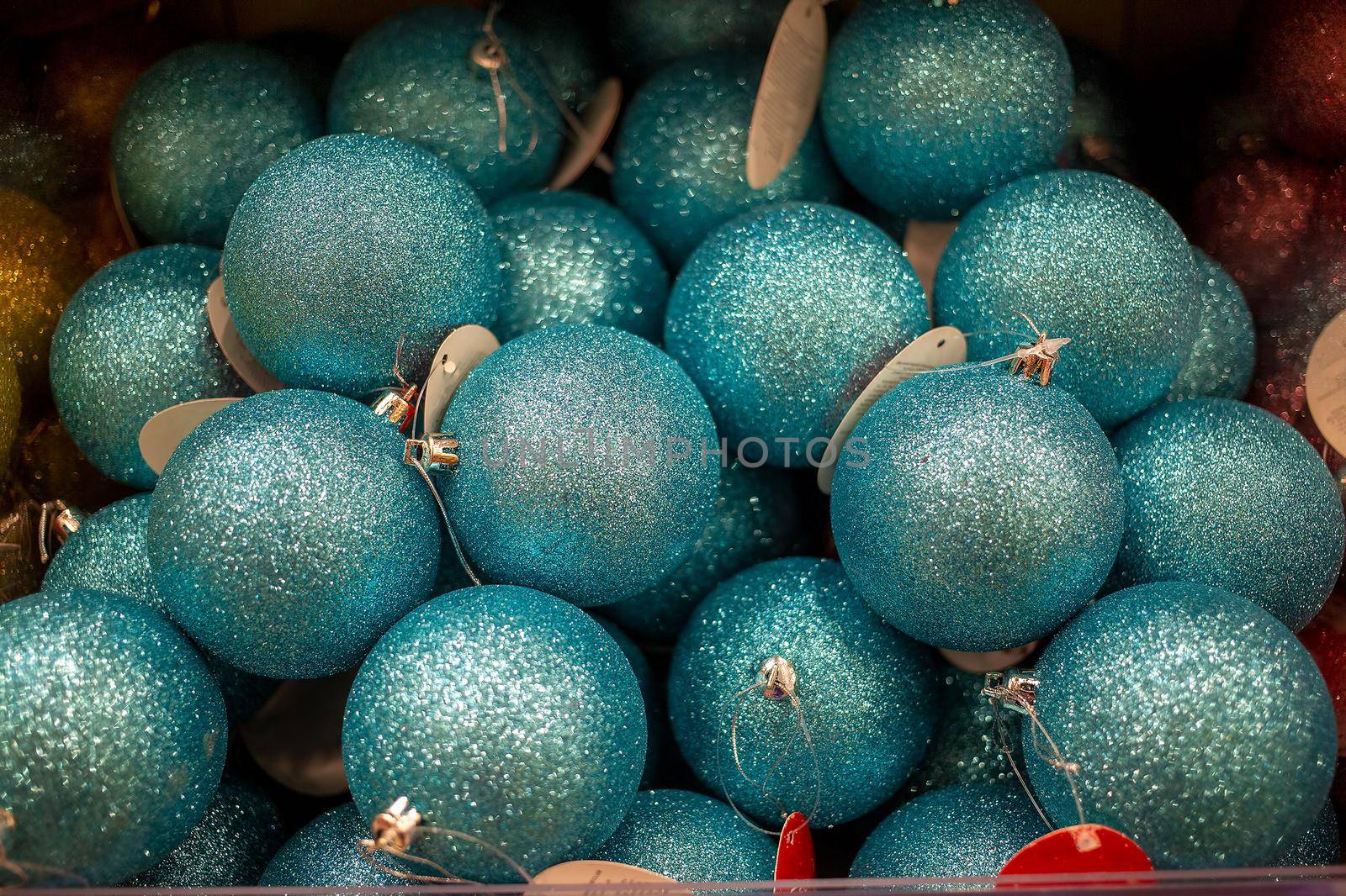 texture New year blue shiny christmas toys balls, decorations for christmas tree. close-up, soft focus. by Mariaprovector