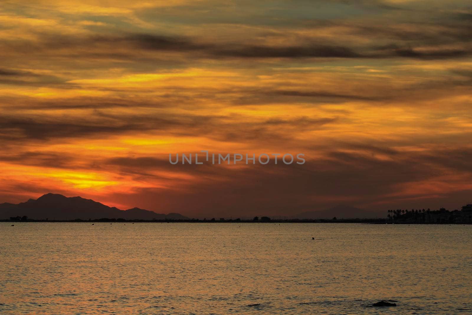 Colorful and Beautiful sky and sea at Sunset in Santa Pola, a small fishing village in southern Spain