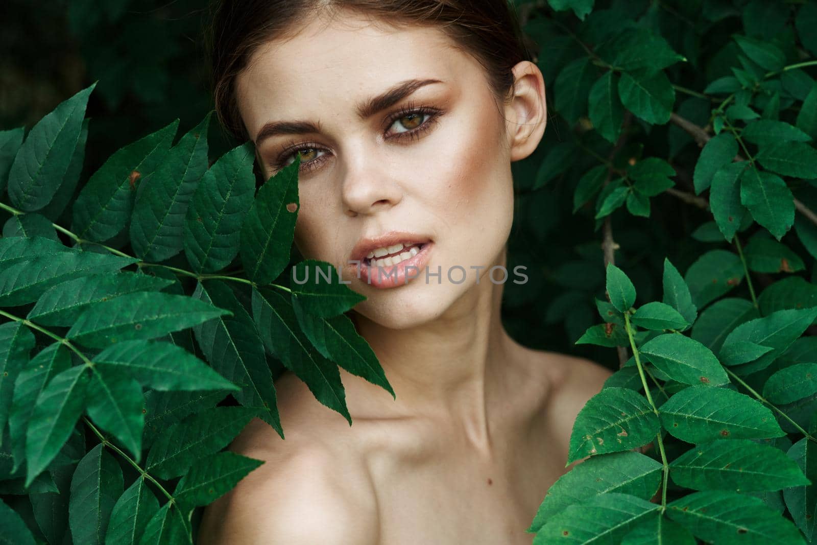 attractive woman skin care bare shoulders green leaves nature model by Vichizh