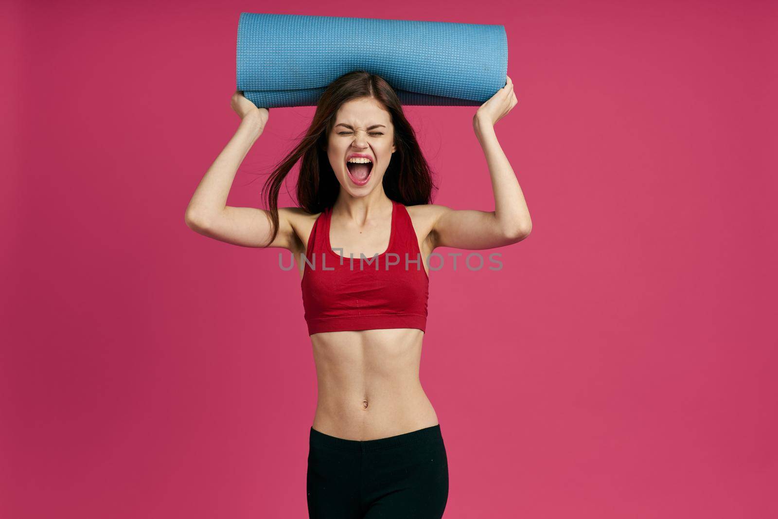 cheerful sportswoman fitness exercise workout isolated background by Vichizh