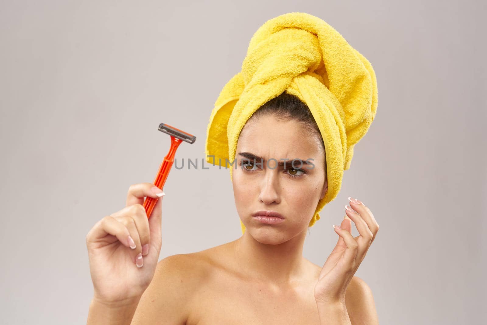pretty woman razor in hand skin care hygiene Lifestyle. High quality photo
