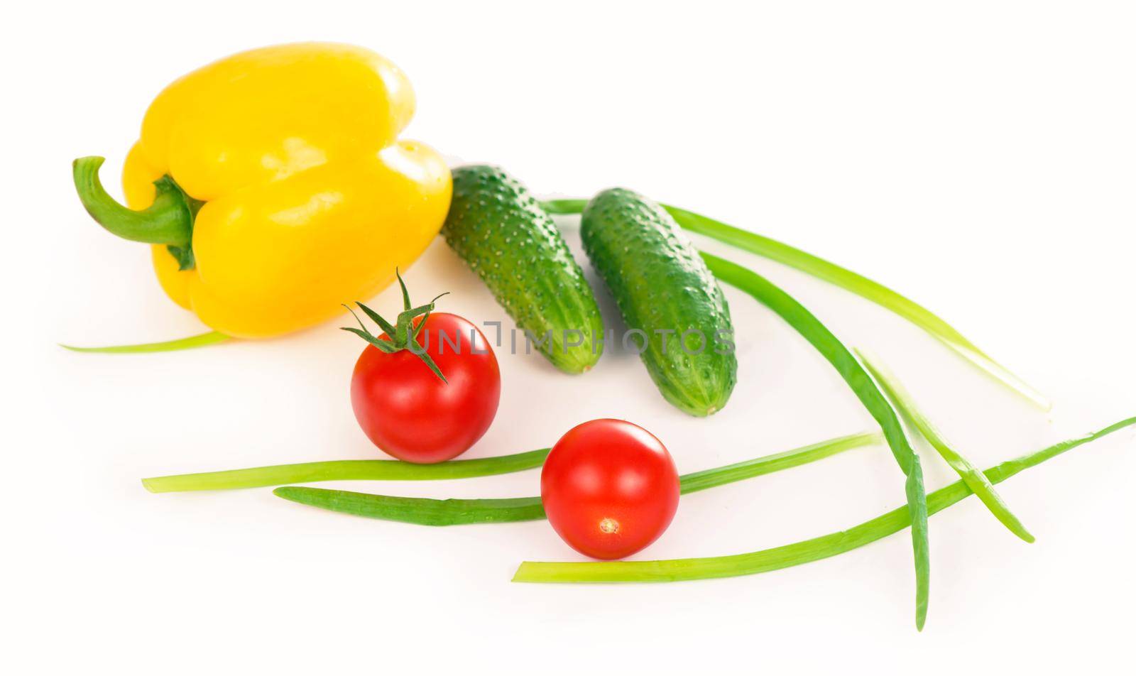 Composition of vegetables on the white background